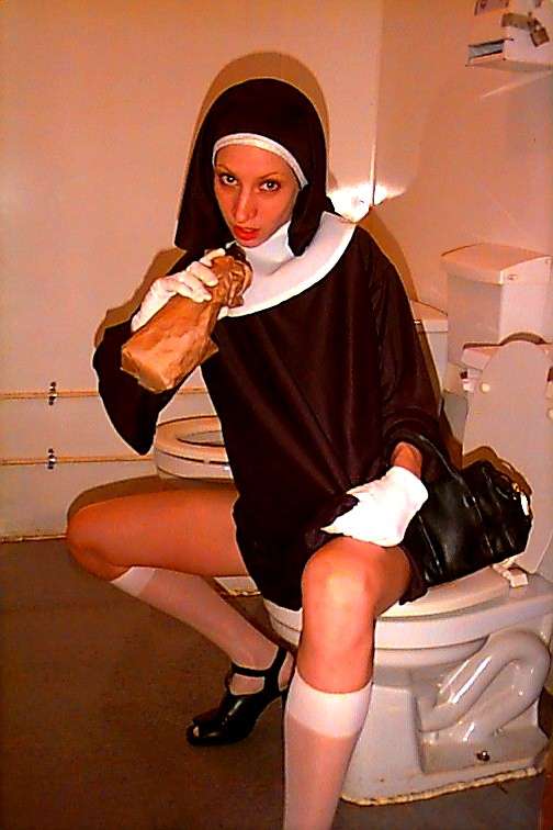 Sister Margarita on Dollies Playhouse toilet drinking