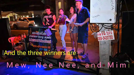 Jack Corbett handing out the prize money for the 2023 Pattaya Dancing Queen contest winners 