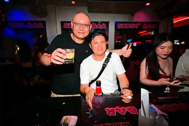 picture of NInja and Thai during Sweet Bar Karaoke